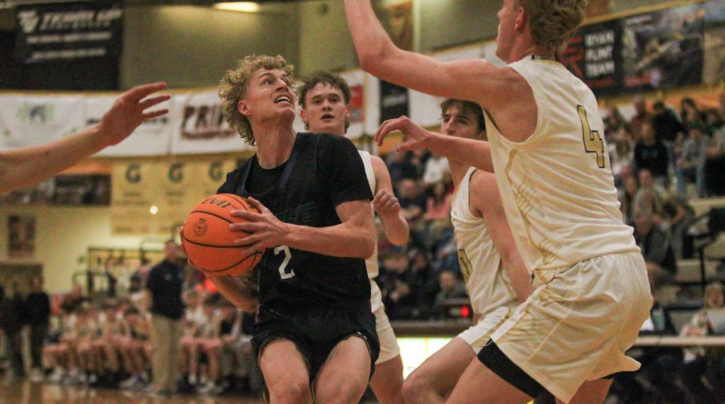 High school boys basketball: Davis Darts complete spectacular comeback in 69-67 overtime win over the Syracuse Titans led by Zach Fisher and Colby&nbsp;Whicker