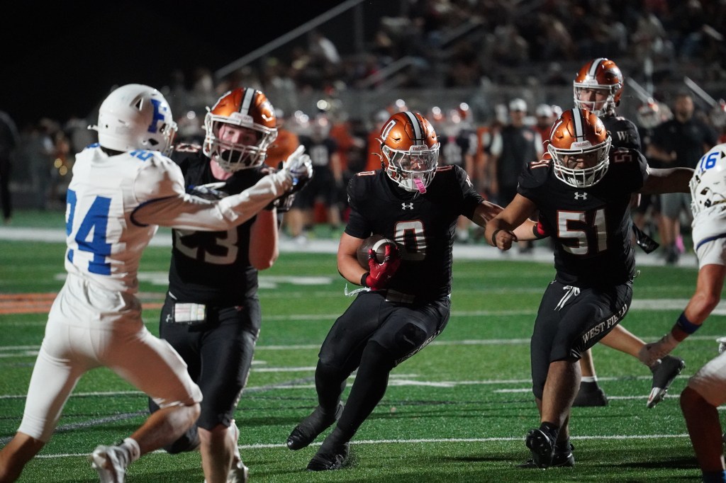 West Field handles Fremont 35–16 behind defense and Judy’s three scores